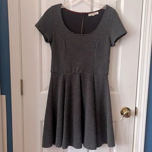 Rewind black and gray striped pleated skater dress.